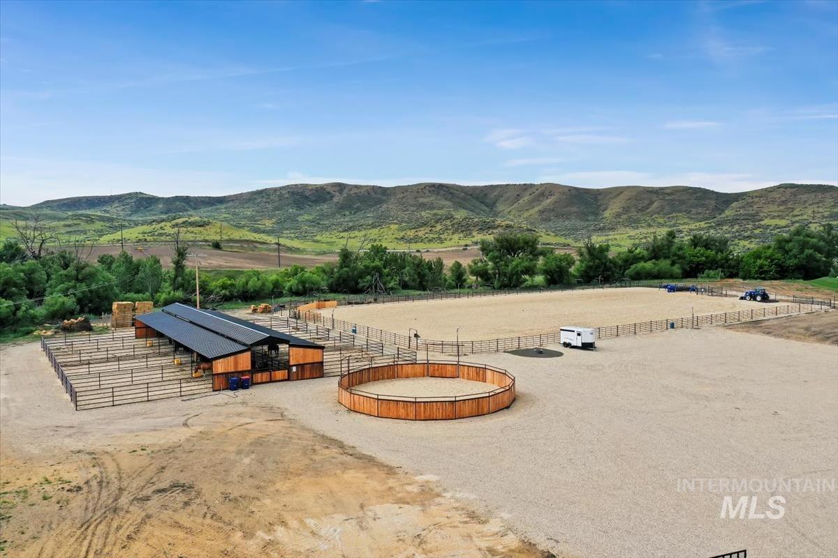 View of mountain background featuring rural landscape