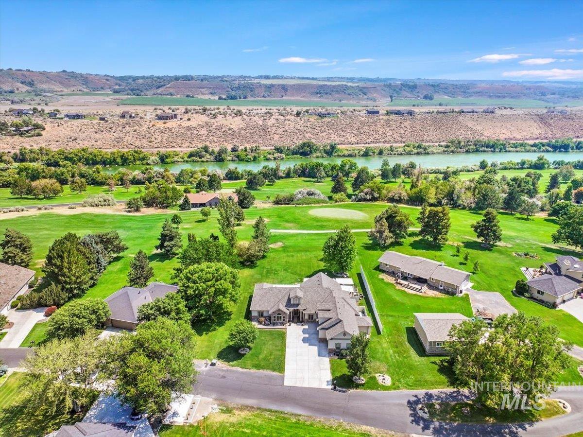 Aerial view of residential area with a large body of water