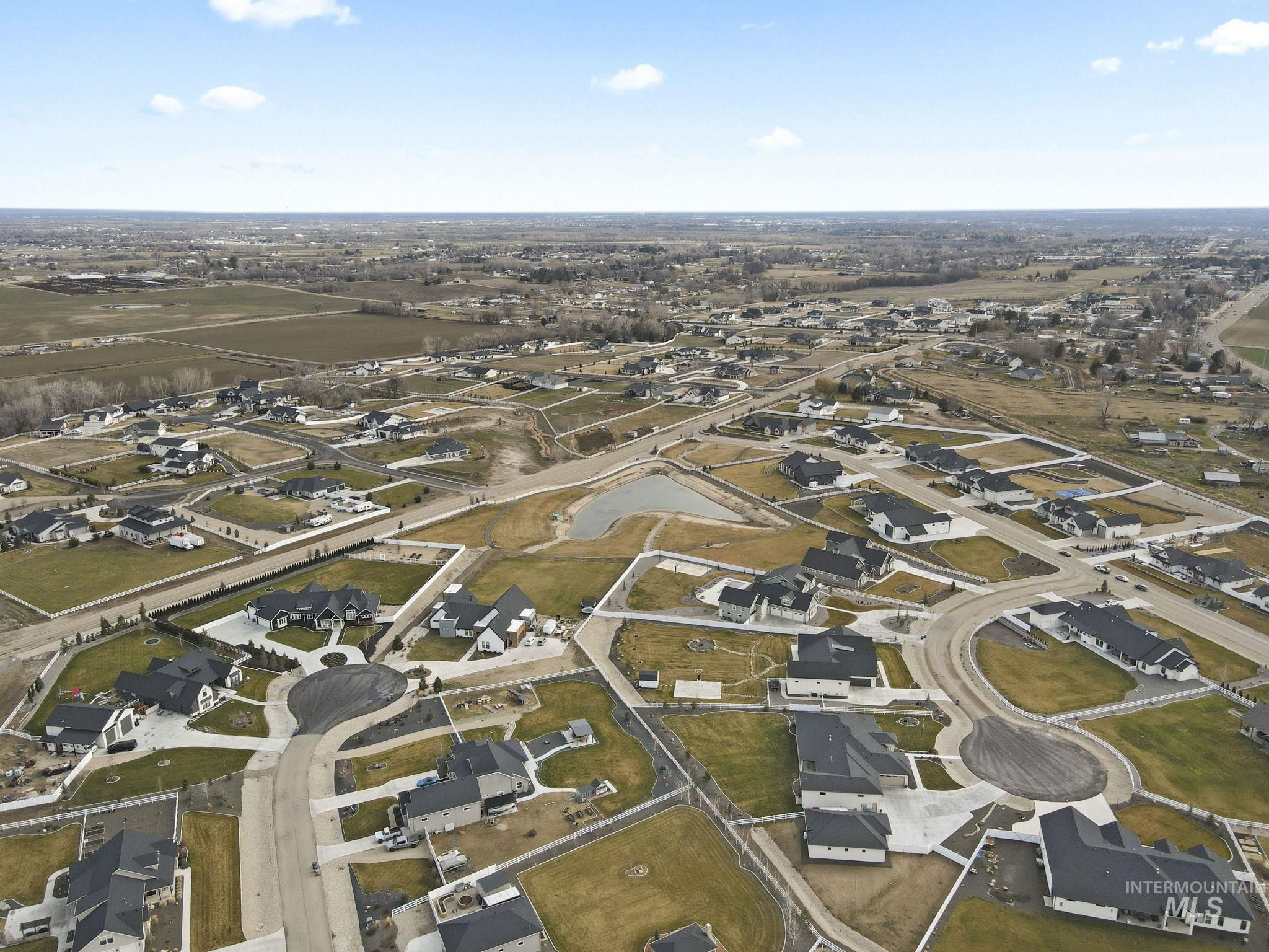 View of property location with nearby suburban area