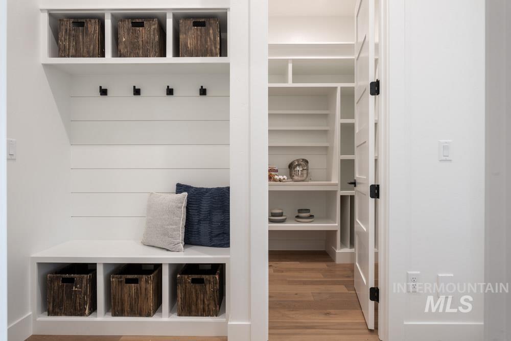 Mudroom featuring light wood-type flooring