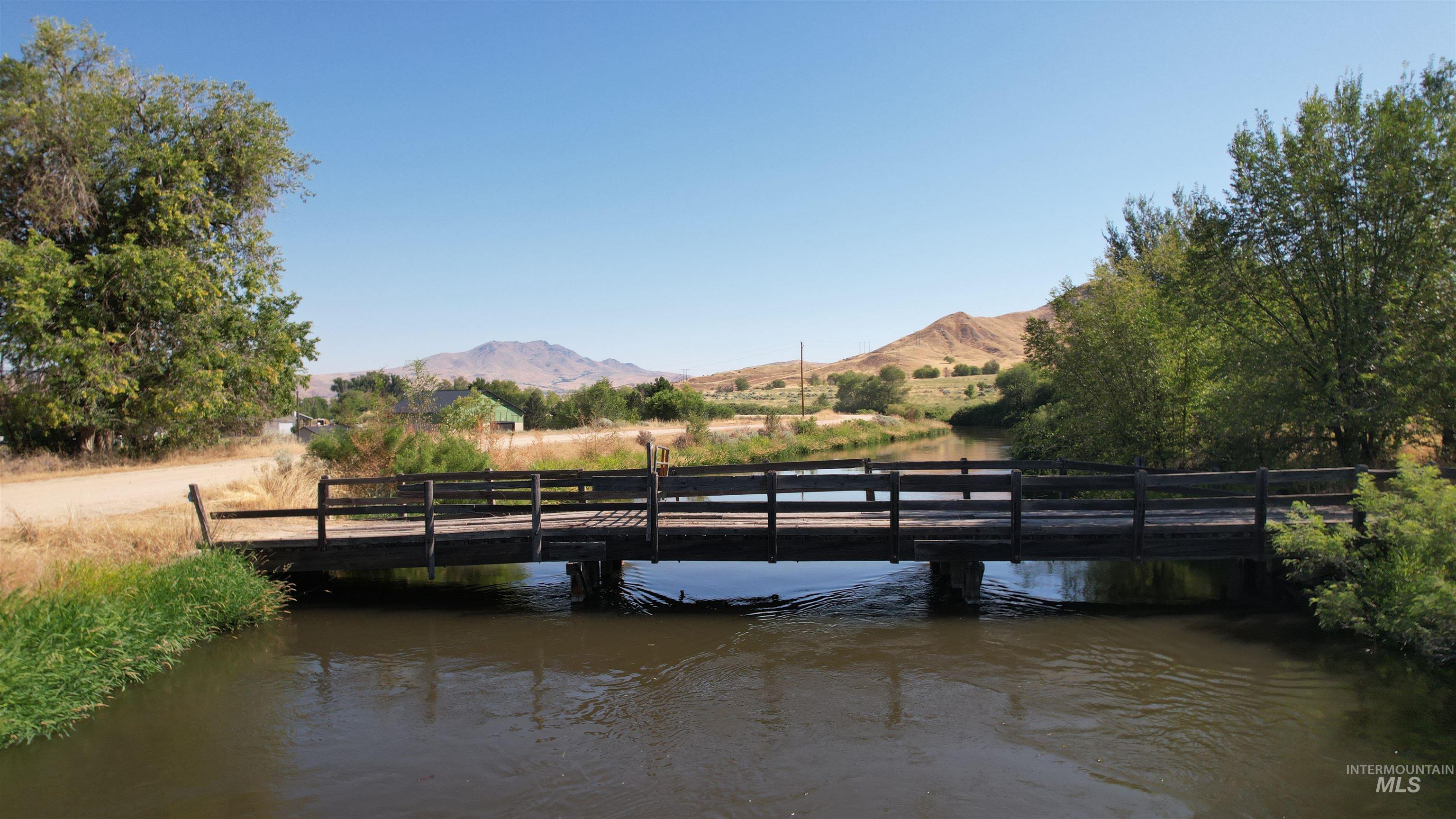 Dock with a water and mountain view