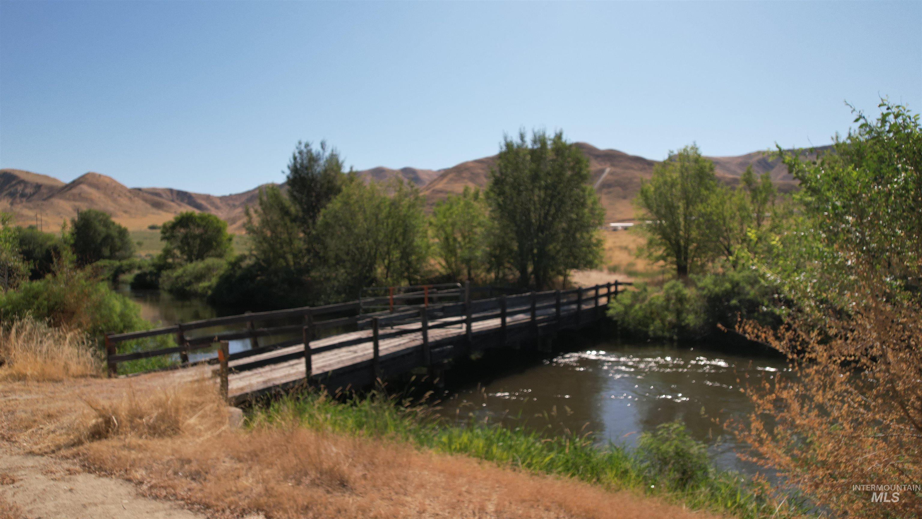 View of mountain backdrop featuring a large body of water