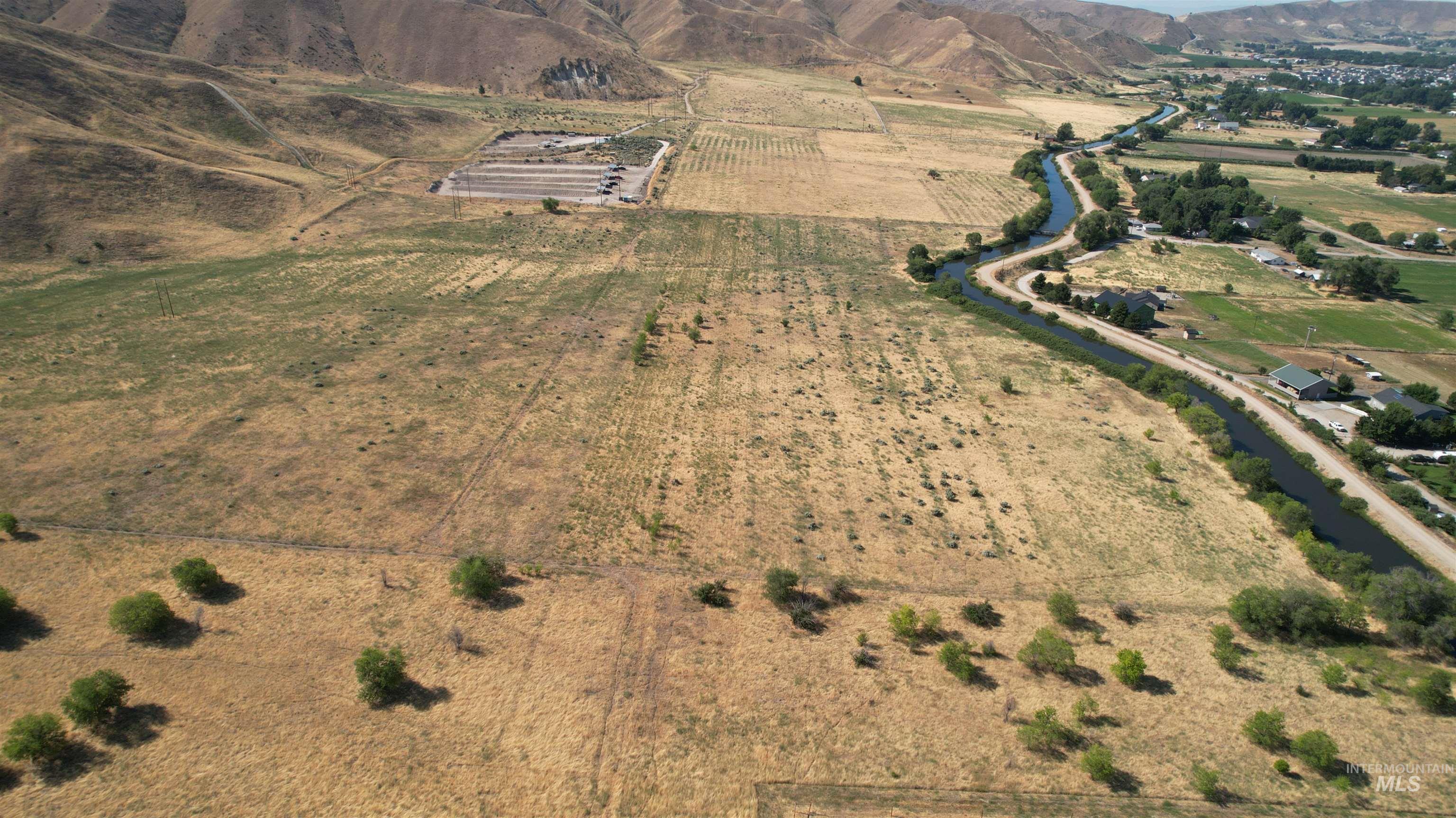 View of property location with rural landscape and extensive farmland