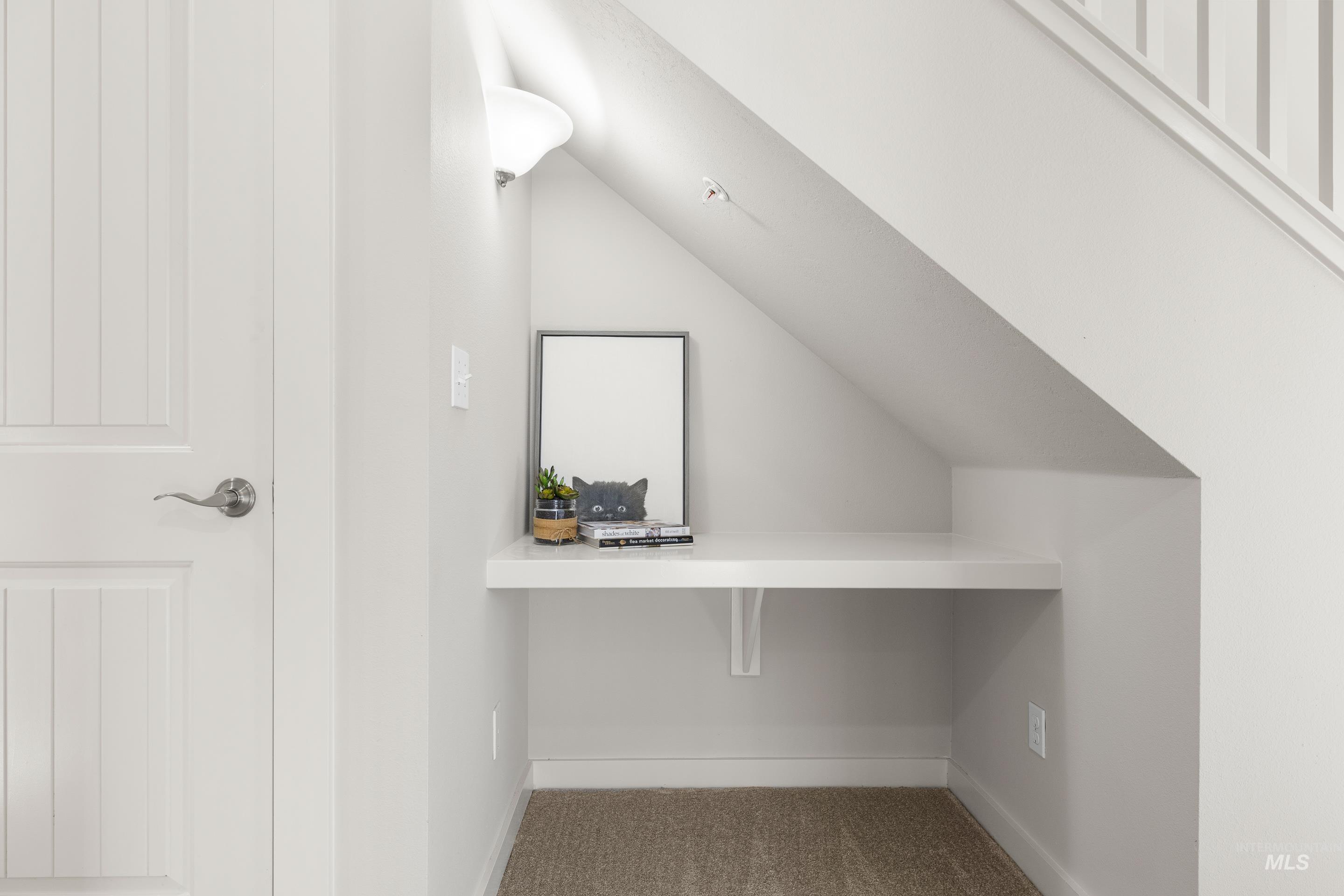 Bonus room featuring carpet and vaulted ceiling