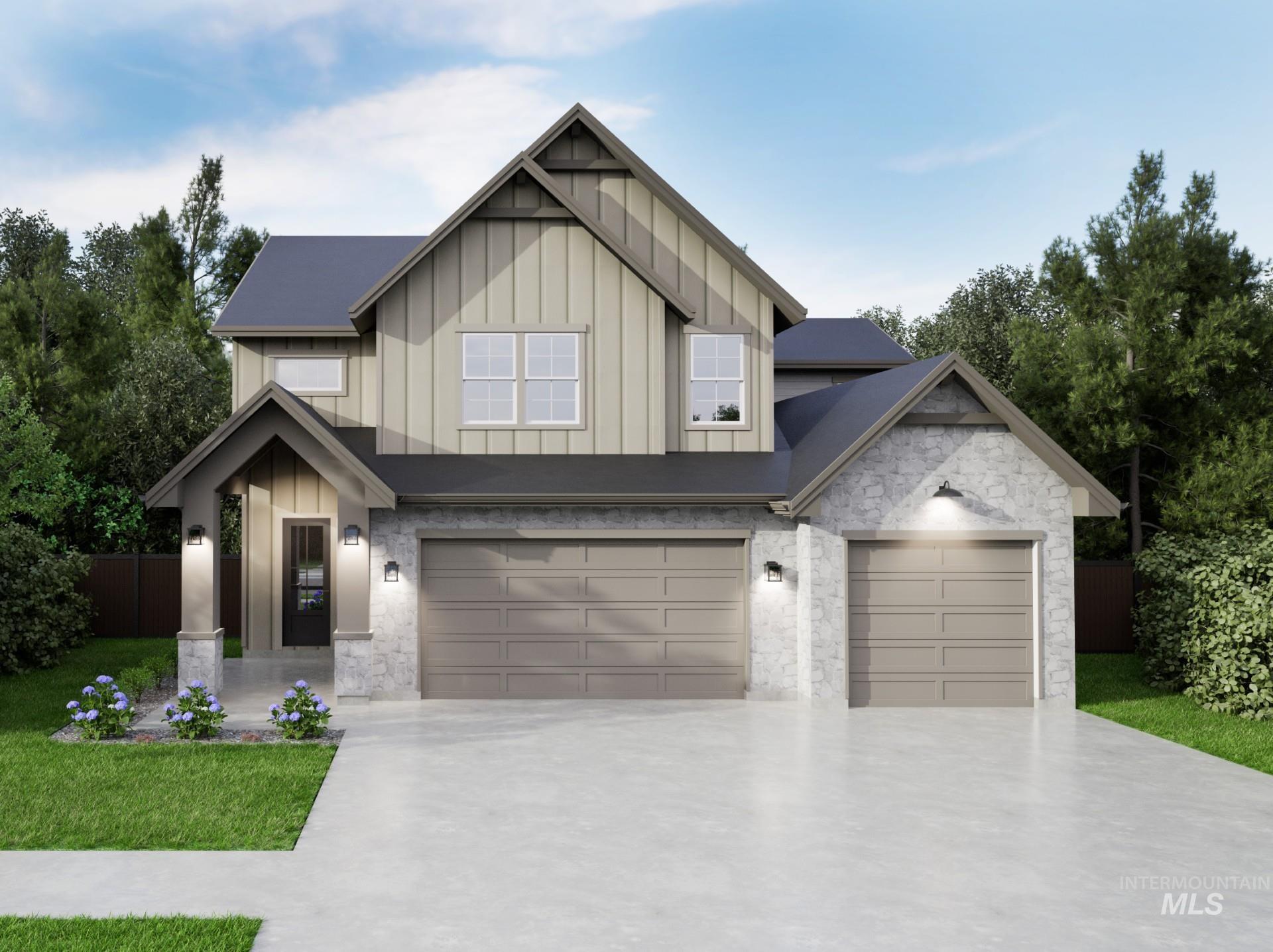 View of front of home featuring stone siding, board and batten siding, concrete driveway, and a garage