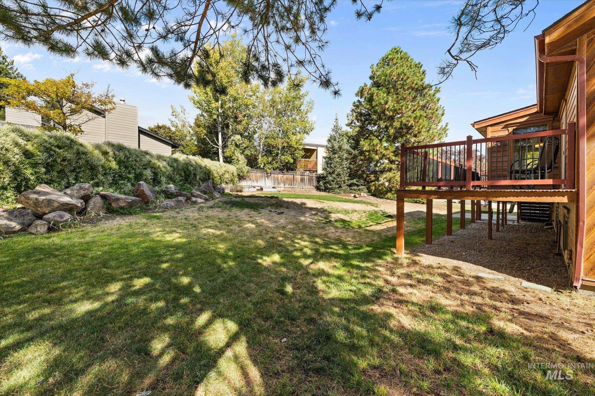 View of yard with a deck