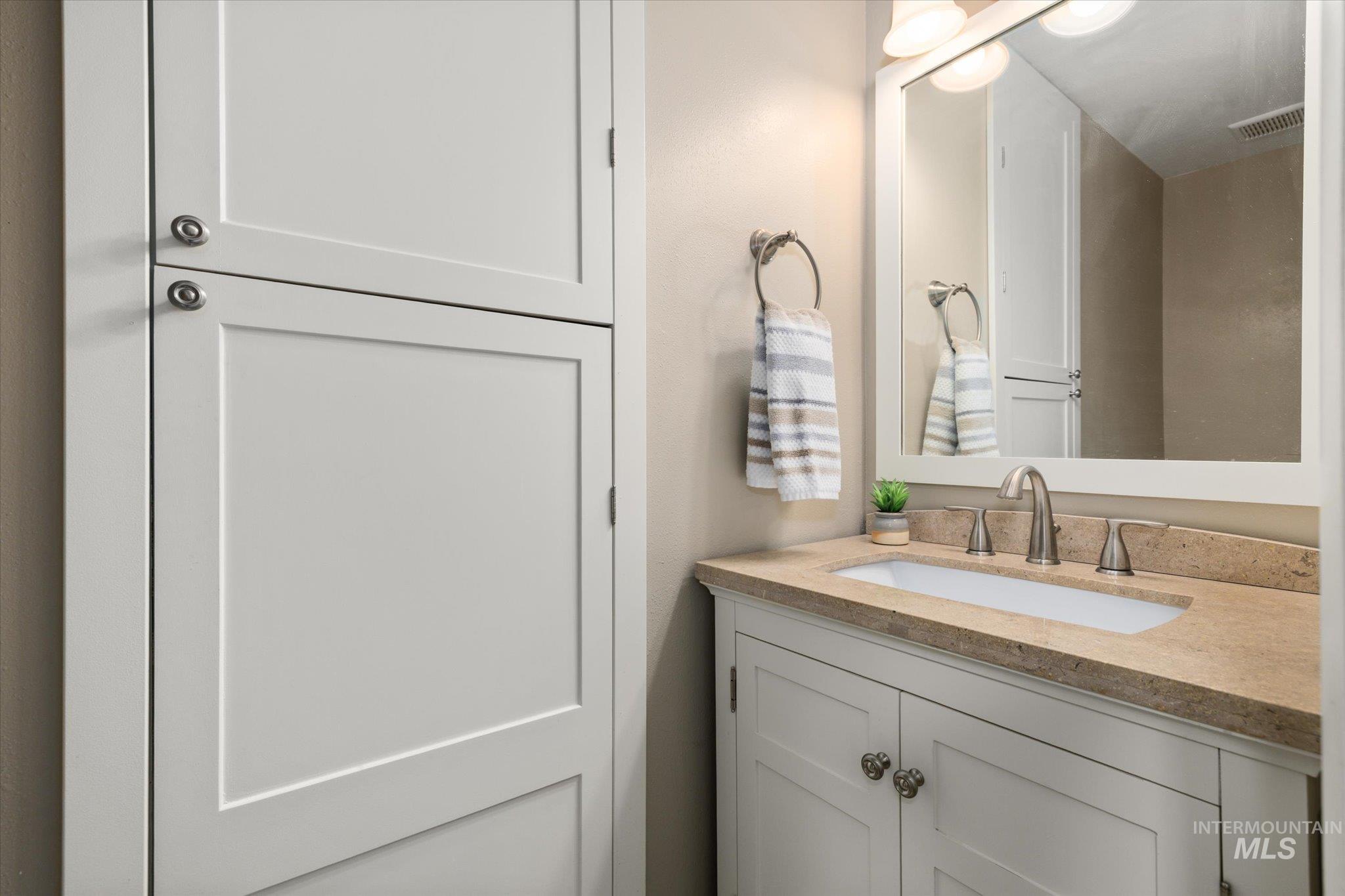 Bathroom featuring vanity