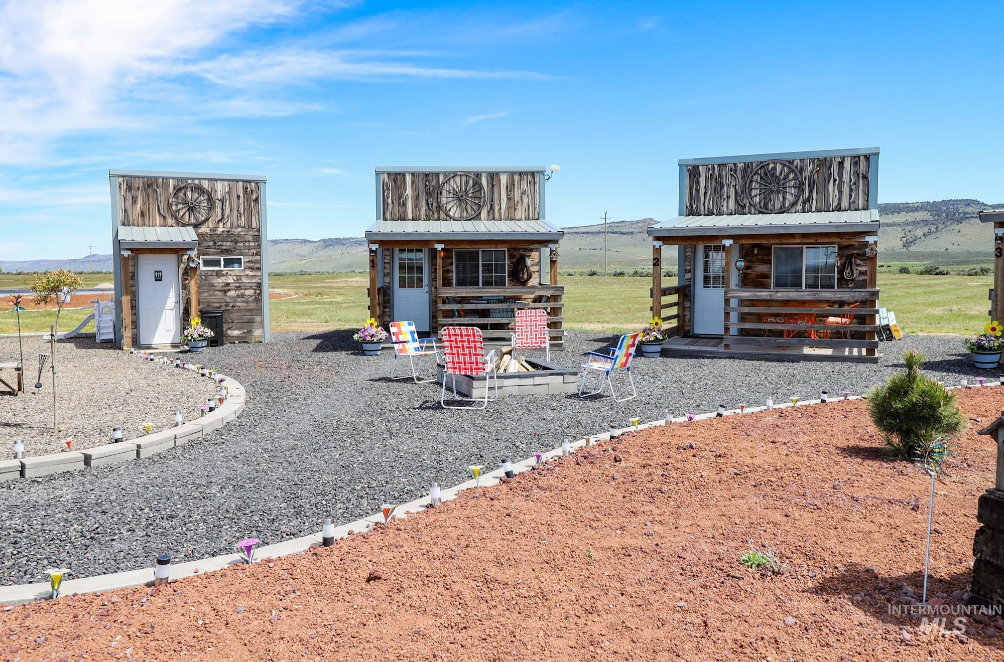 View of playground featuring an outbuilding