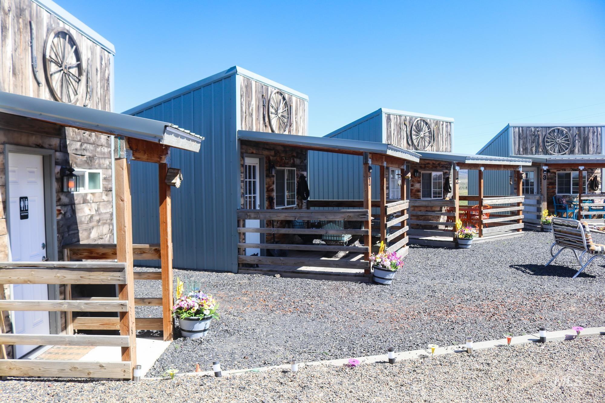 View of front of property with an exterior structure and an outbuilding