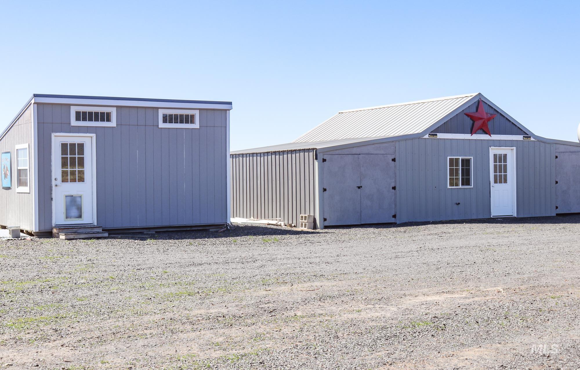 View of outdoor structure featuring entry steps