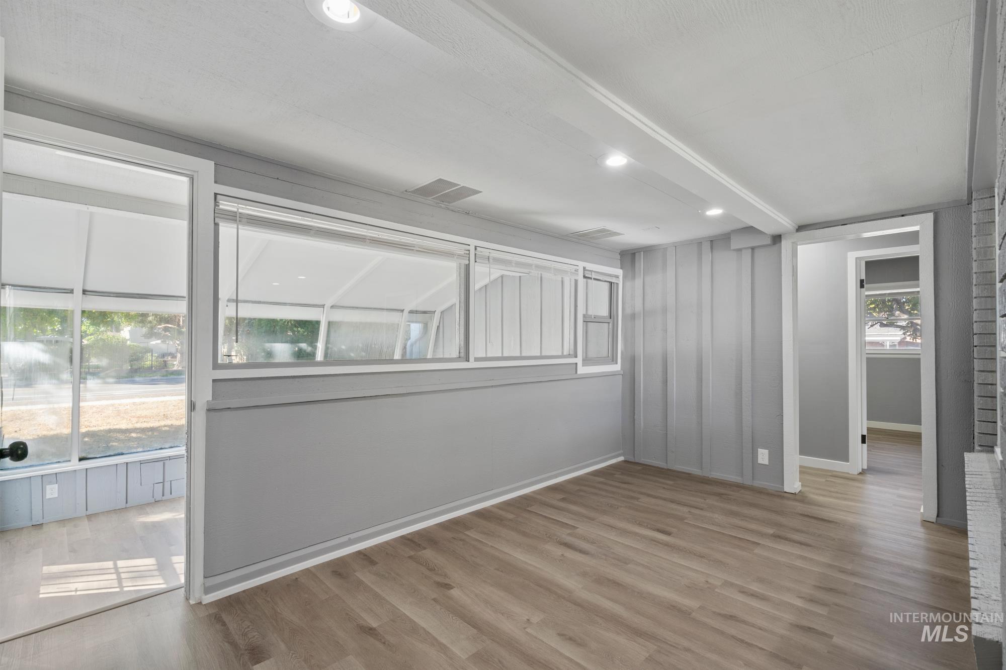 Unfurnished room featuring recessed lighting and light wood-style floors