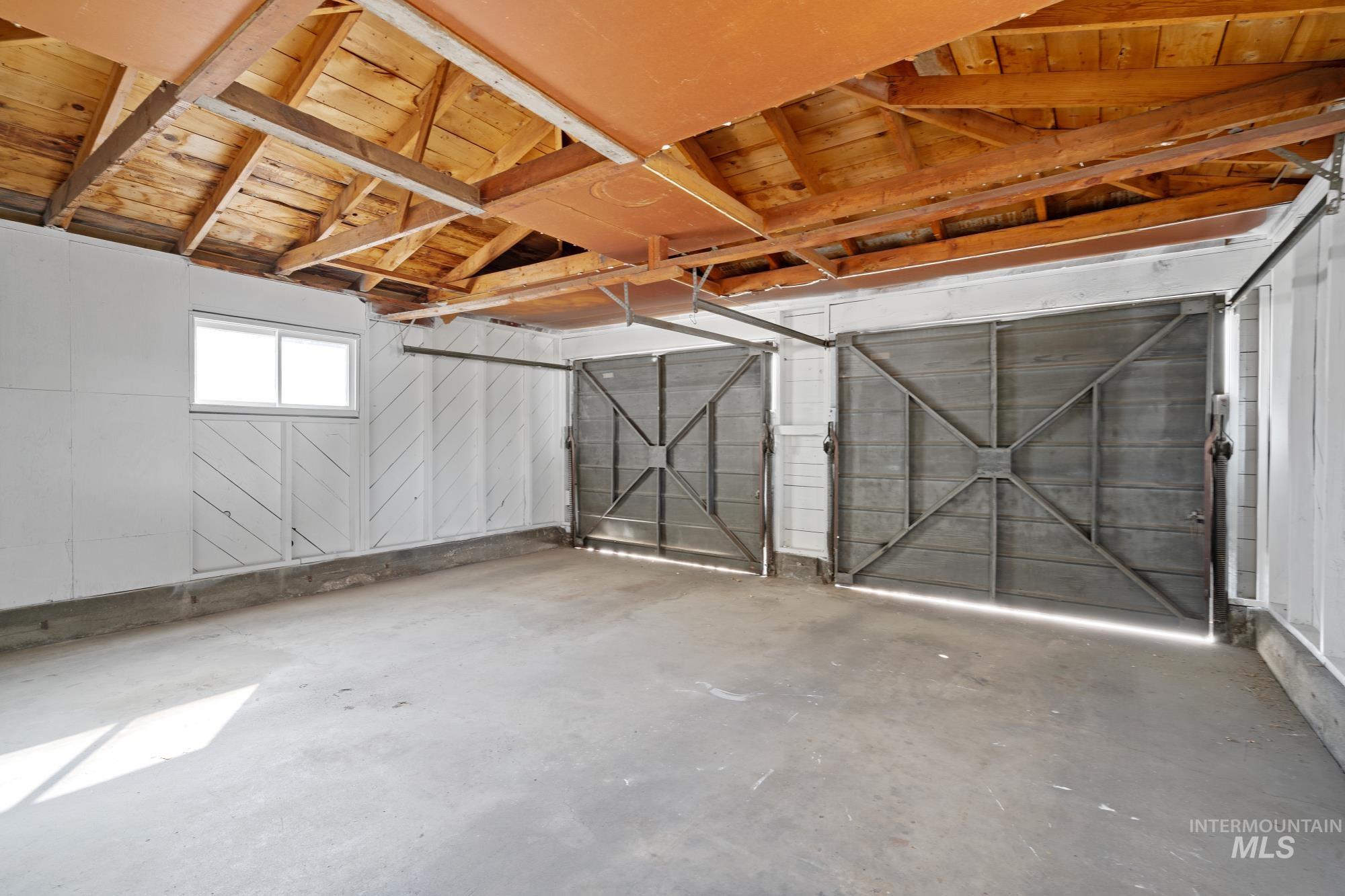 Garage with wooden ceiling