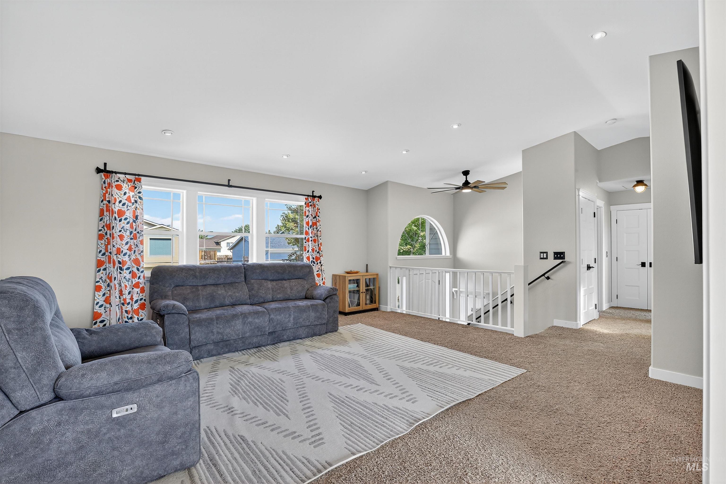 Living room featuring carpet floors and recessed lighting