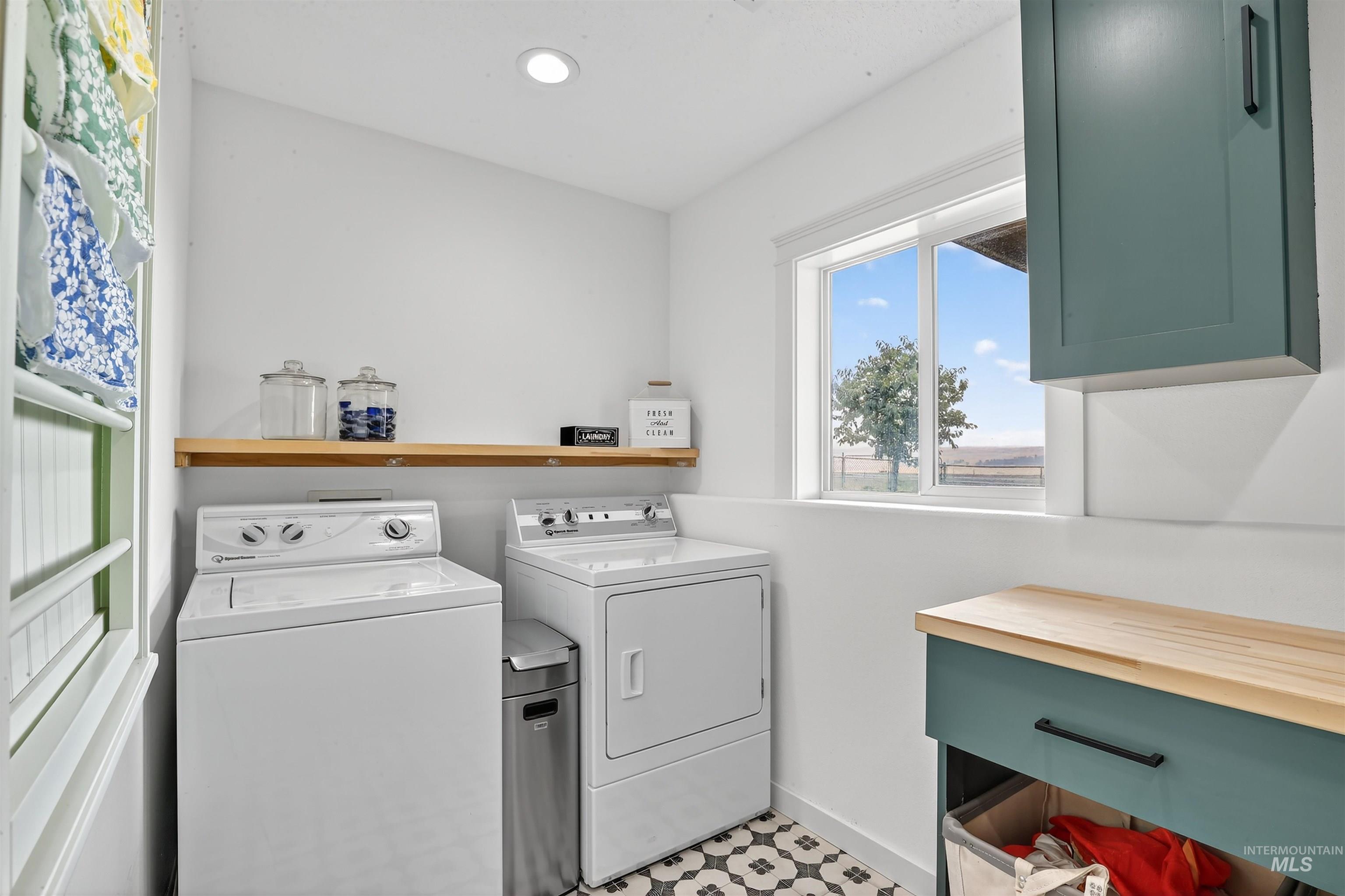 Washroom with independent washer and dryer and recessed lighting