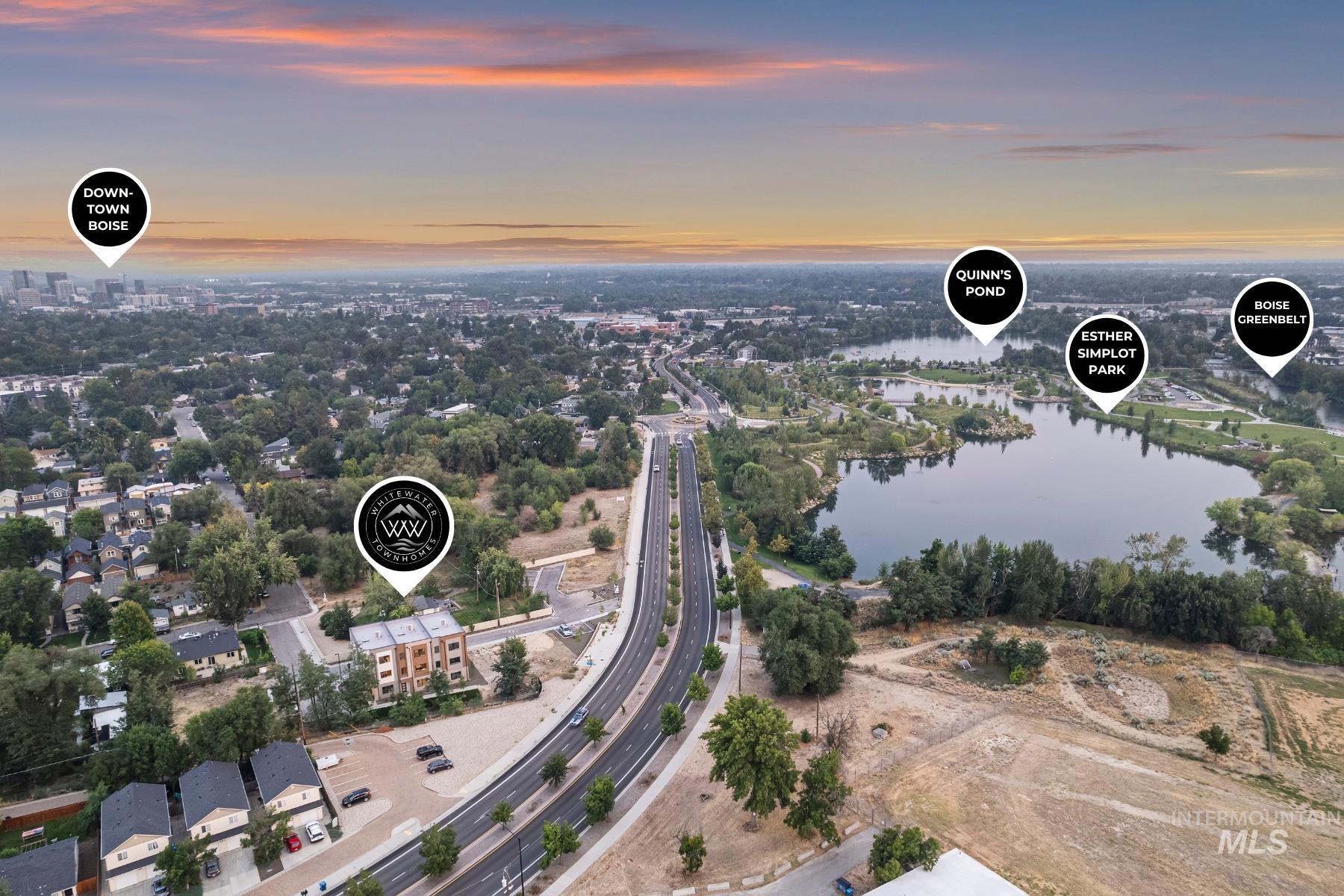 Bird's eye view of a large body of water and a main thoroughfare