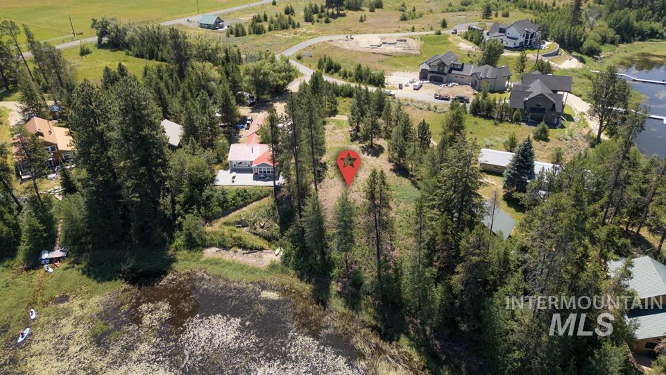 Aerial view of property and surrounding area with rural landscape
