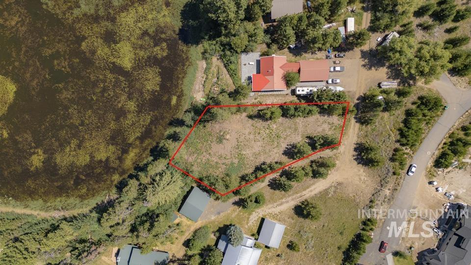 Aerial overview of property's location with property parcel outlined