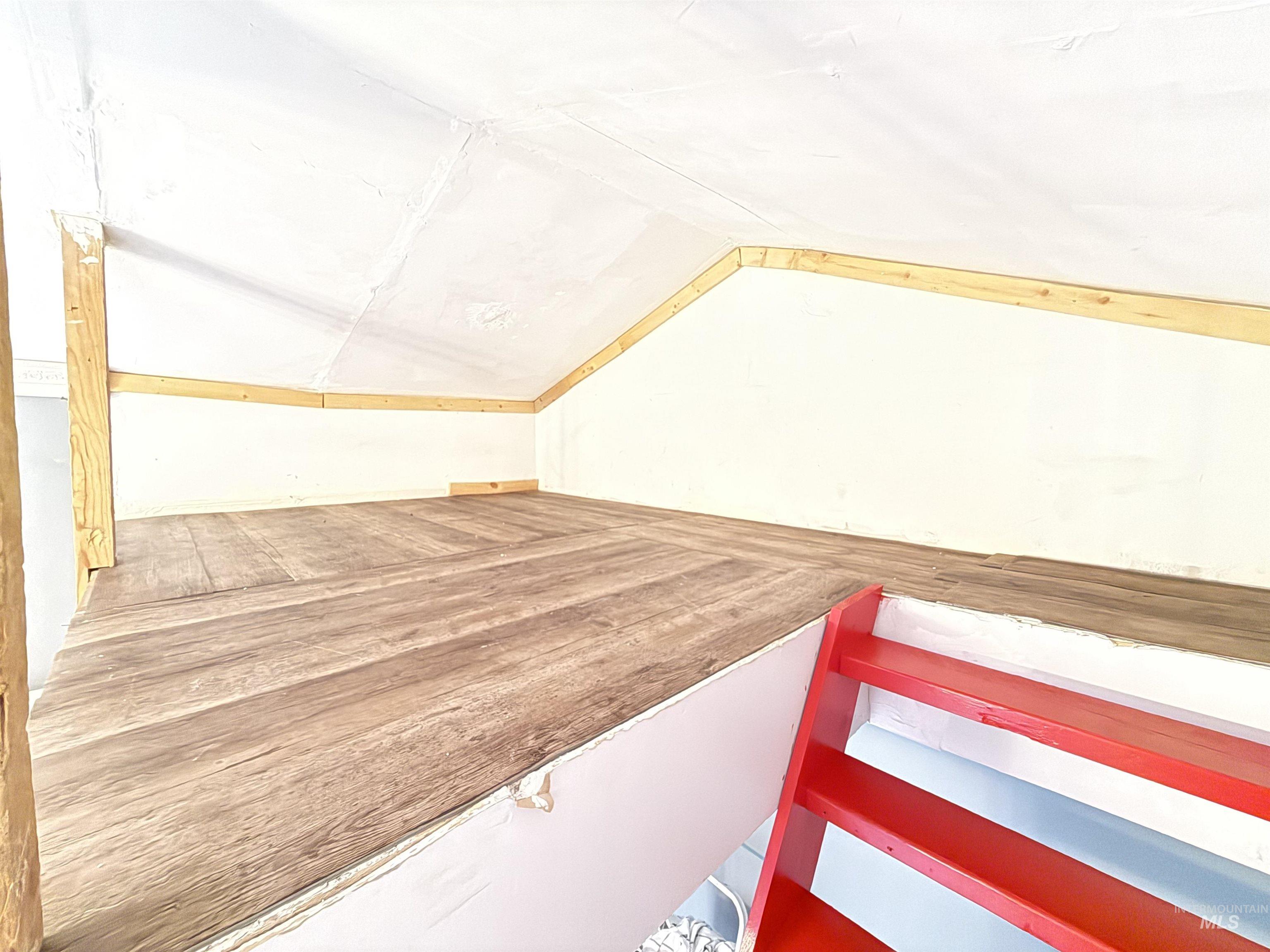 Bonus room featuring lofted ceiling
