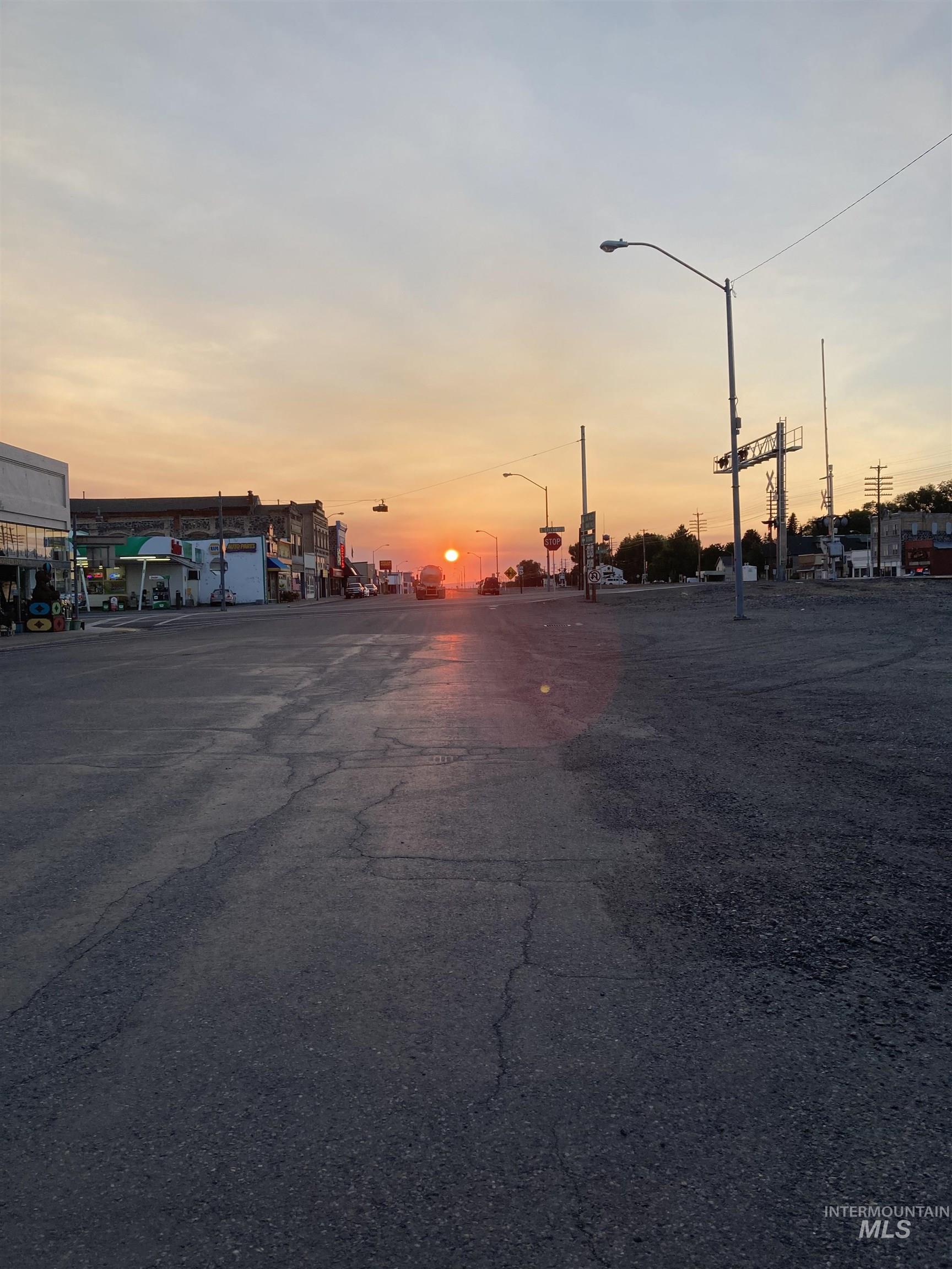 View of asphalt street with street lighting