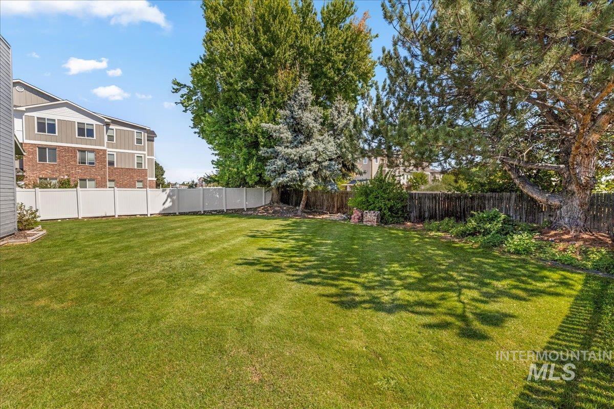 View of fenced backyard