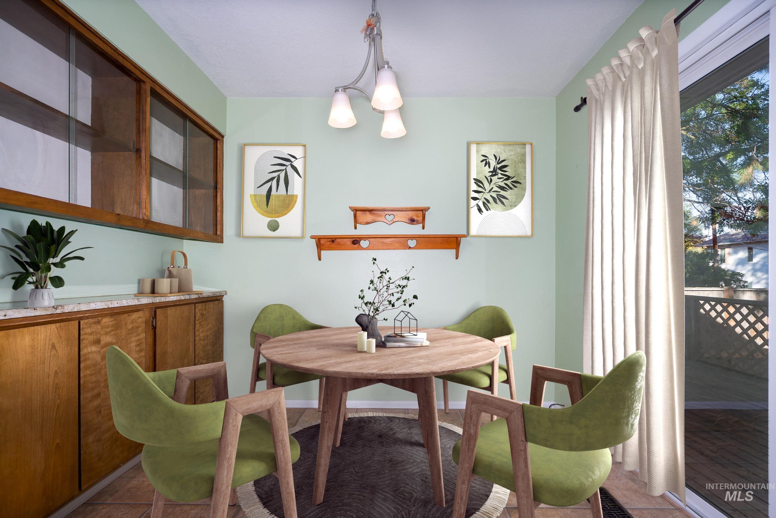 Dining space with tile patterned flooring and a chandelier