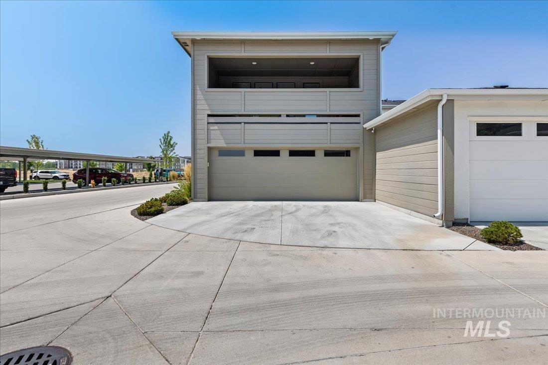 Garage featuring driveway