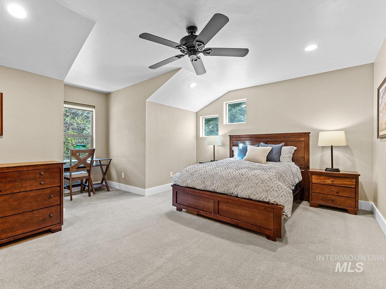 Bedroom with carpet flooring, lofted ceiling, recessed lighting, and a ceiling fan