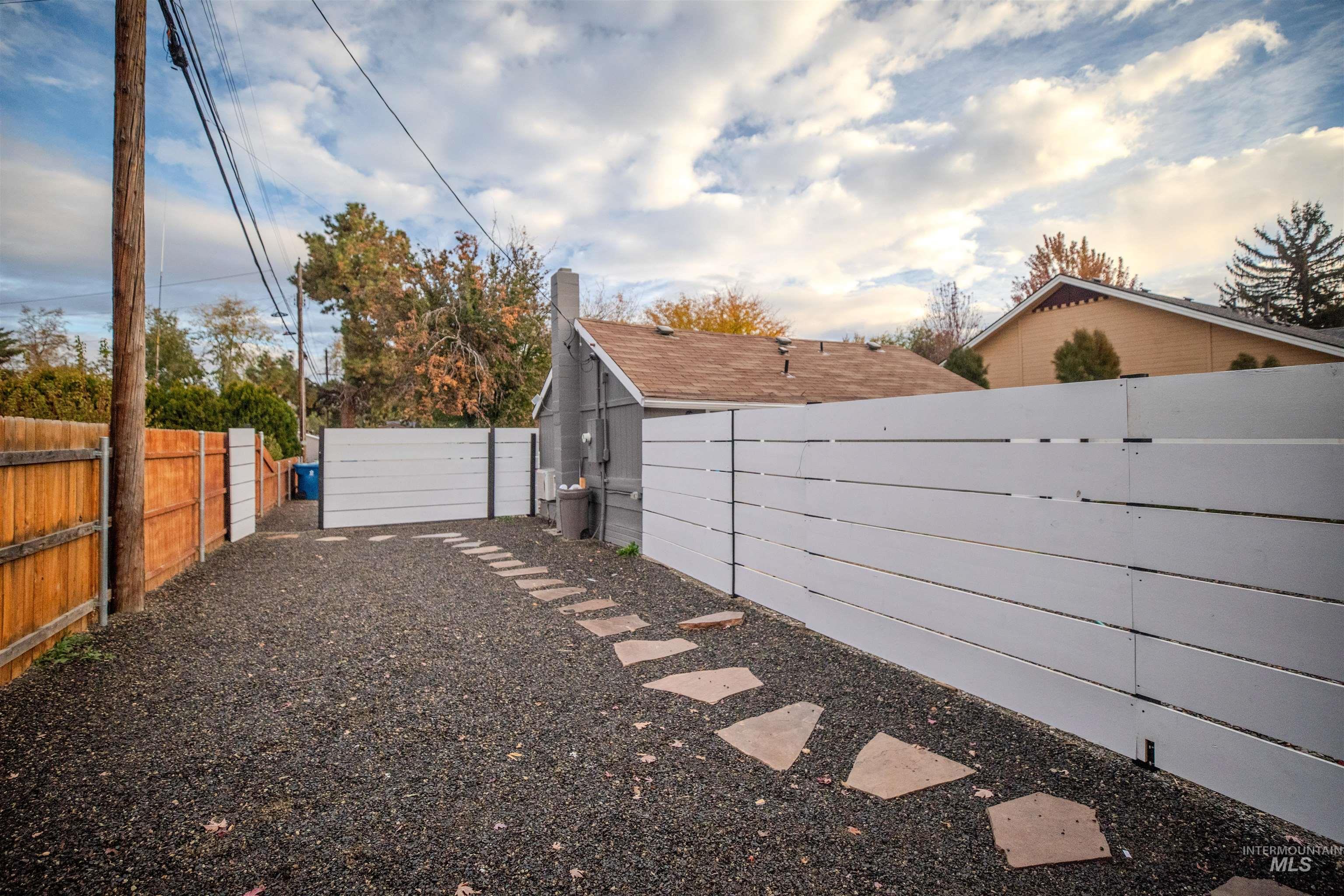 Fenced courtyard of the detached studio unit.