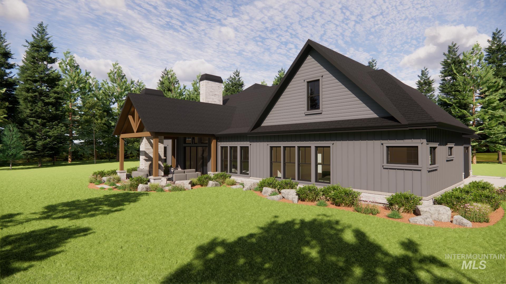 Back of property with a yard, a chimney, and a shingled roof
