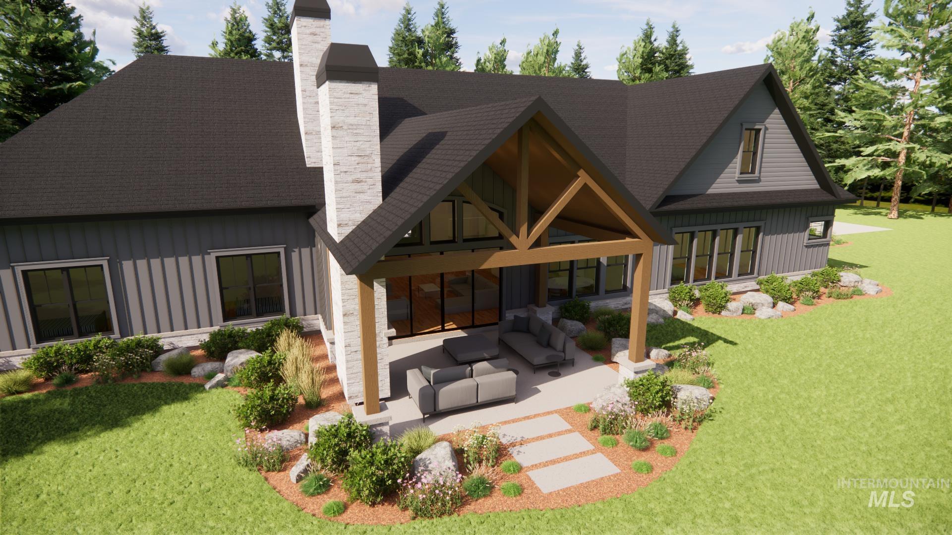 Rear view of house with a patio, a chimney, board and batten siding, and a lawn