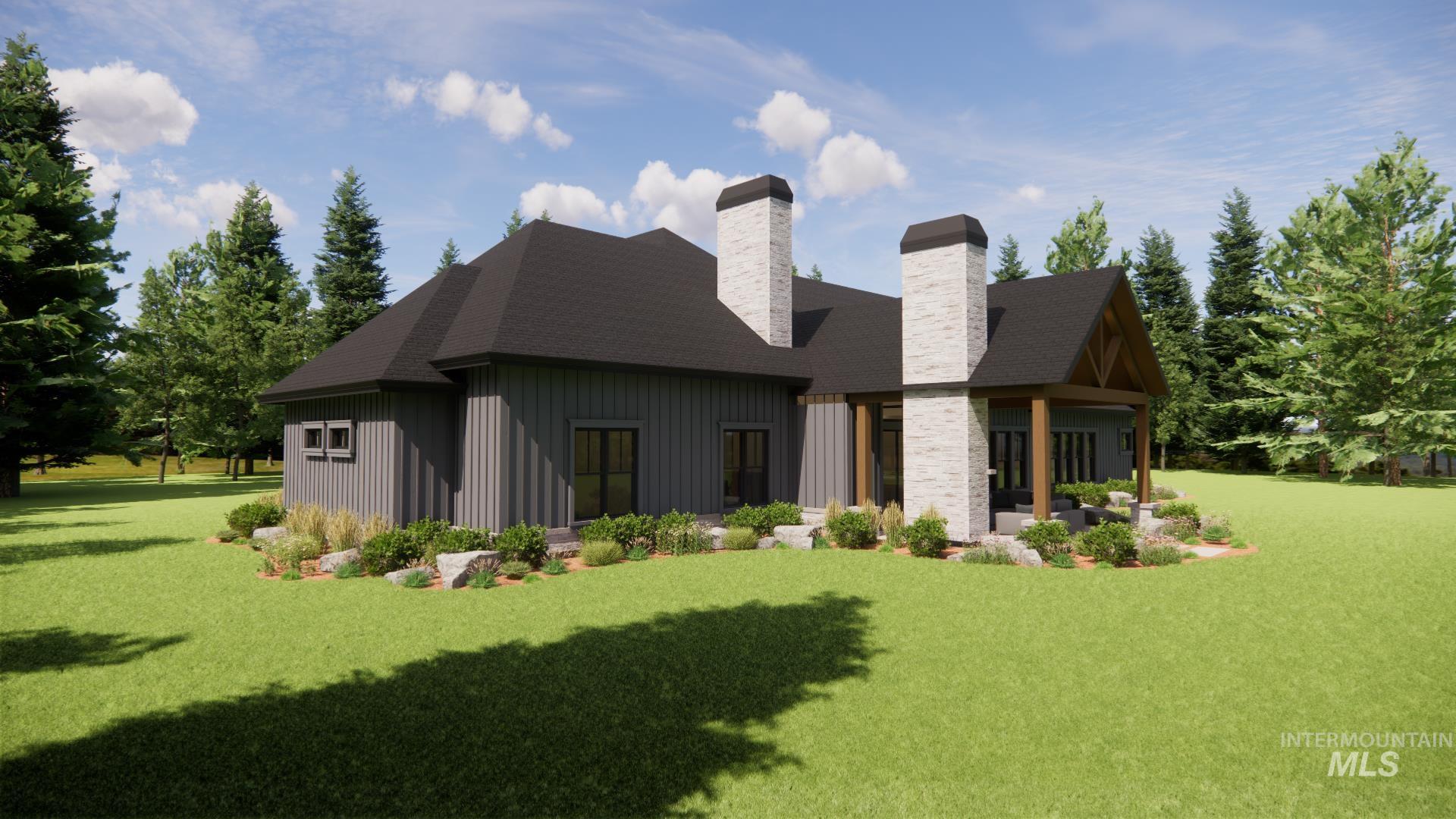 Rear view of house featuring a lawn, a chimney, roof with shingles, and board and batten siding