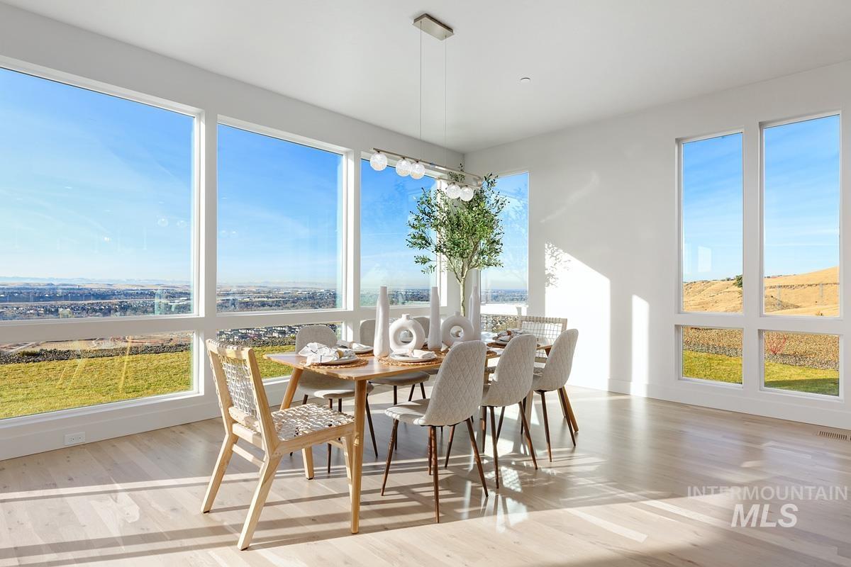 Sunroom / solarium featuring healthy amount of natural light