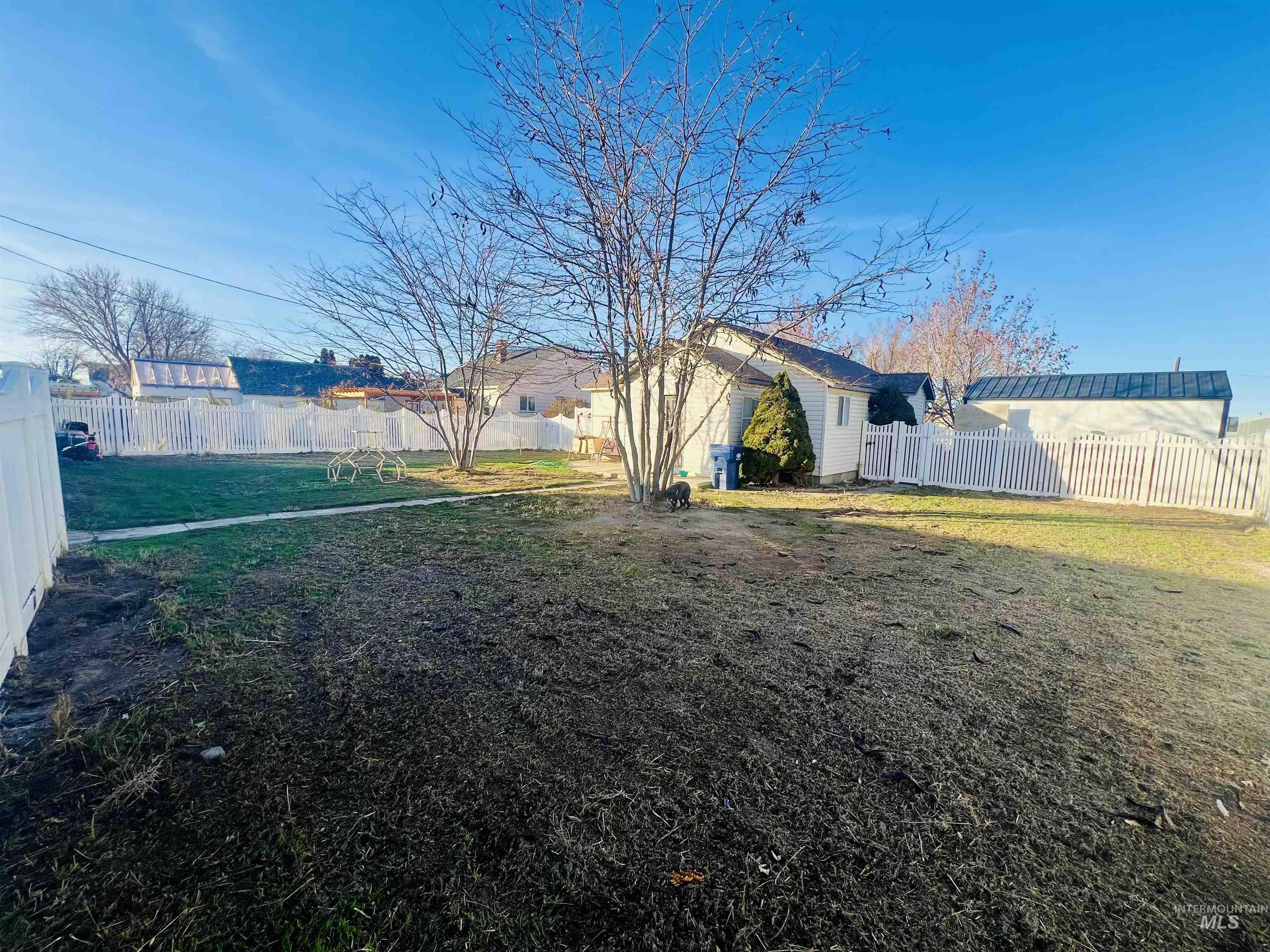 View of fenced backyard