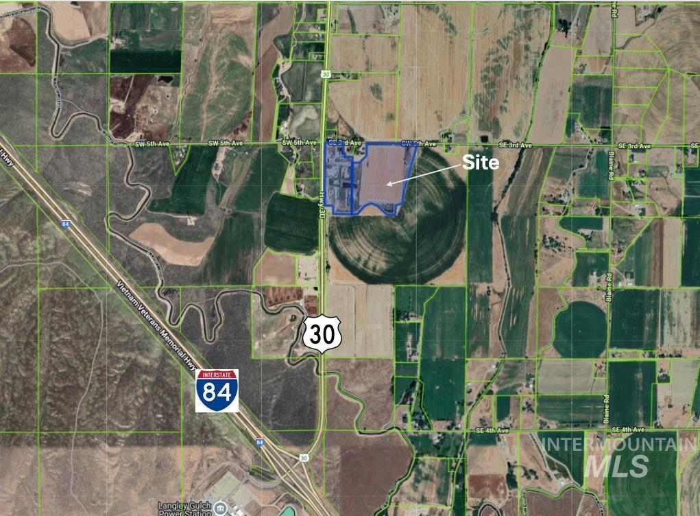 Aerial overview of property's location with property parcel outlined