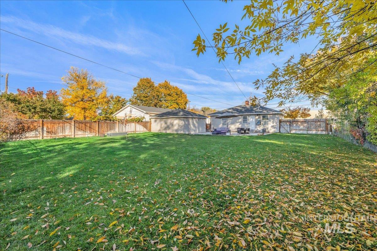 View of fenced backyard