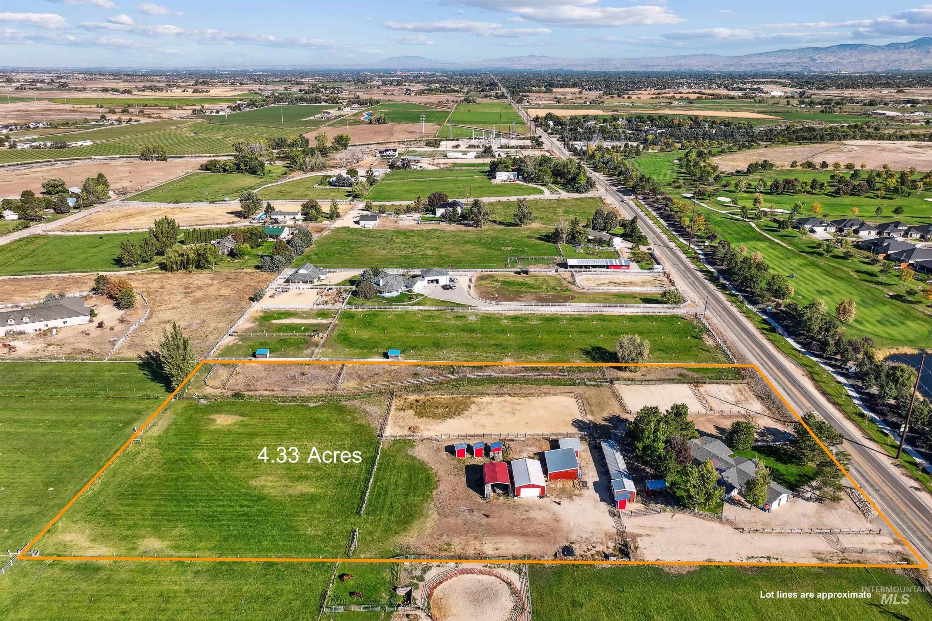 View of rural area featuring property parcel outlined and mountains