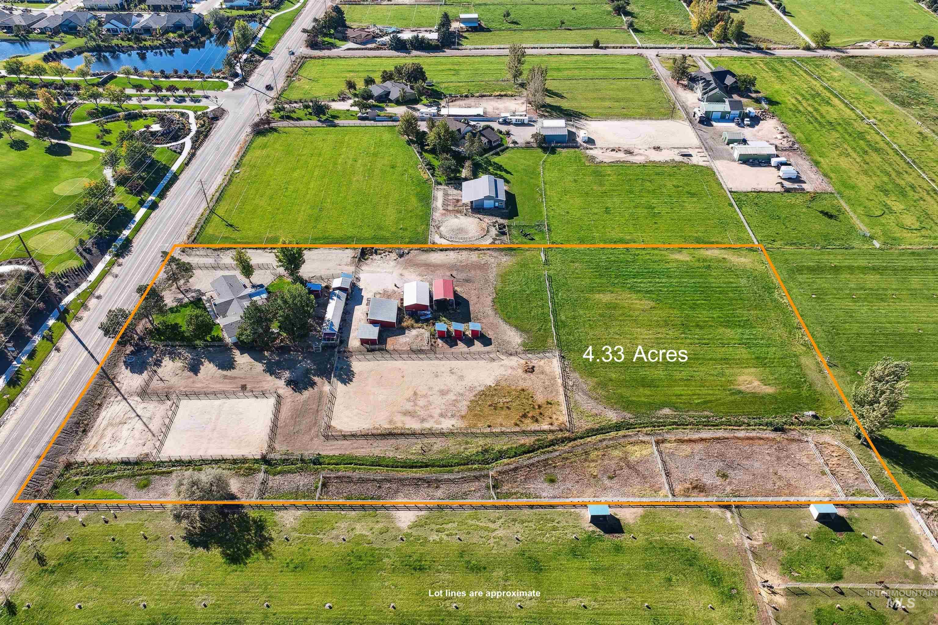 Aerial overview of property's location featuring property boundaries highlighted and a large body of water