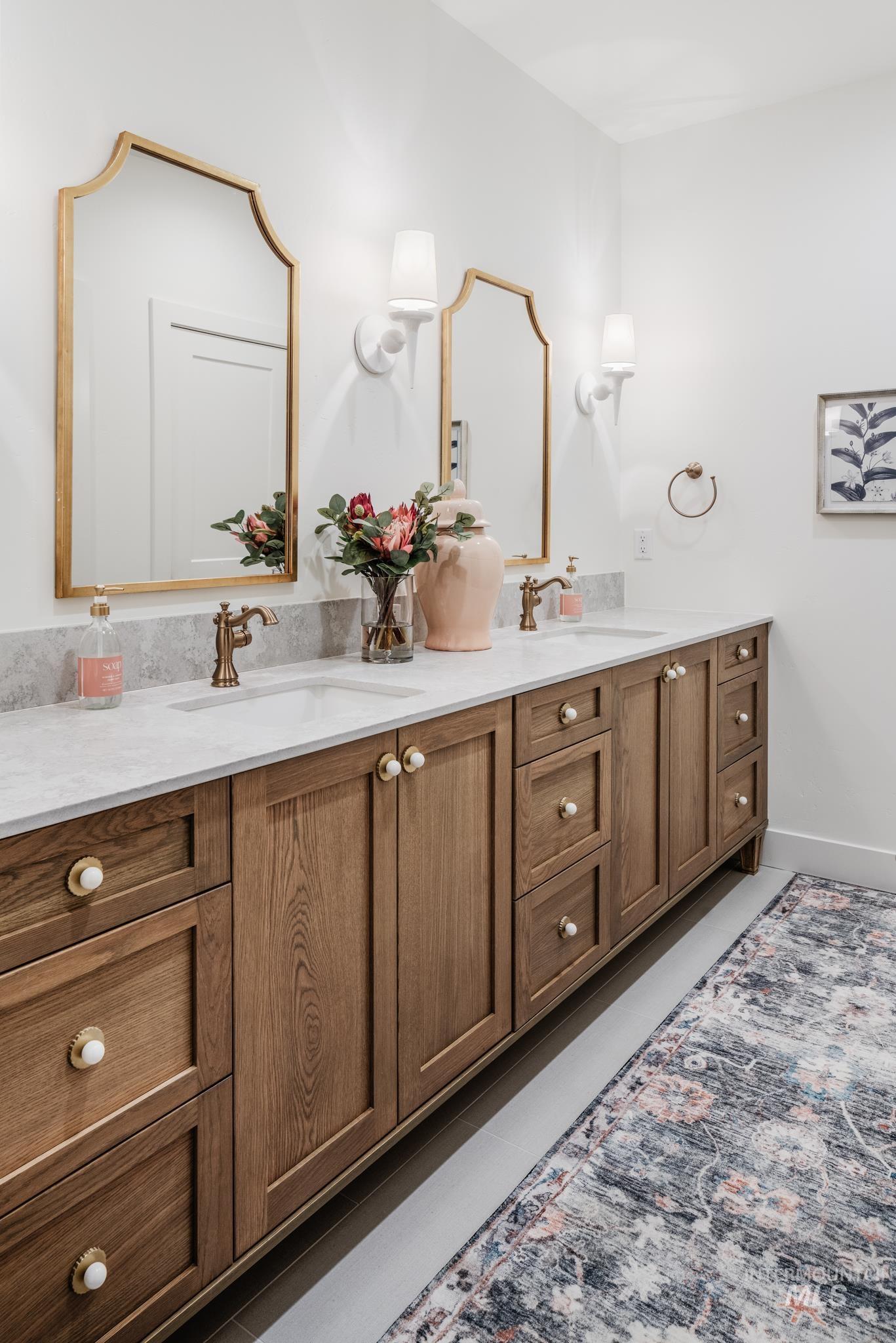 Bathroom featuring double vanity