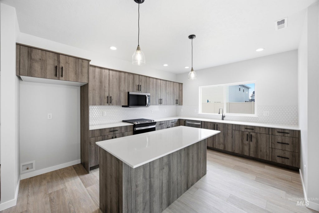 Photo of 5319 S Edgecomb Way, Nampa, ID 83686 (MLS # 99001386)