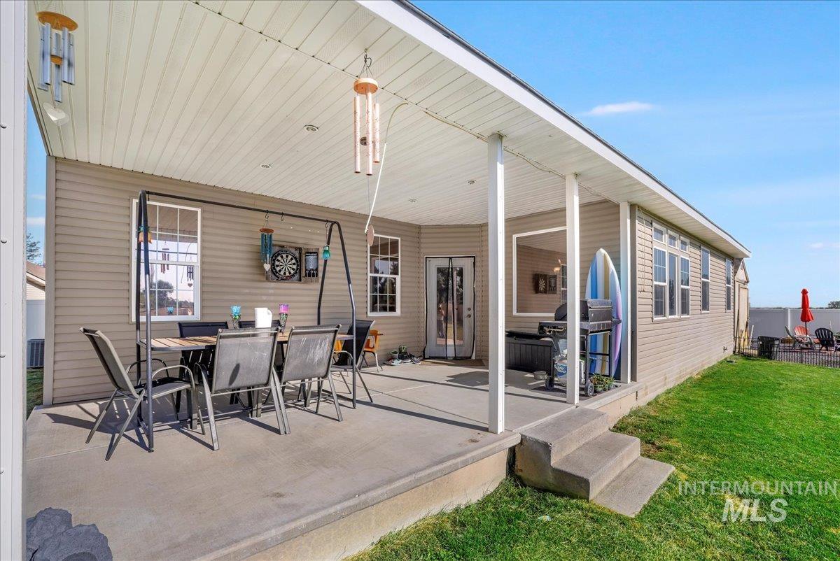 View of patio with outdoor dining space
