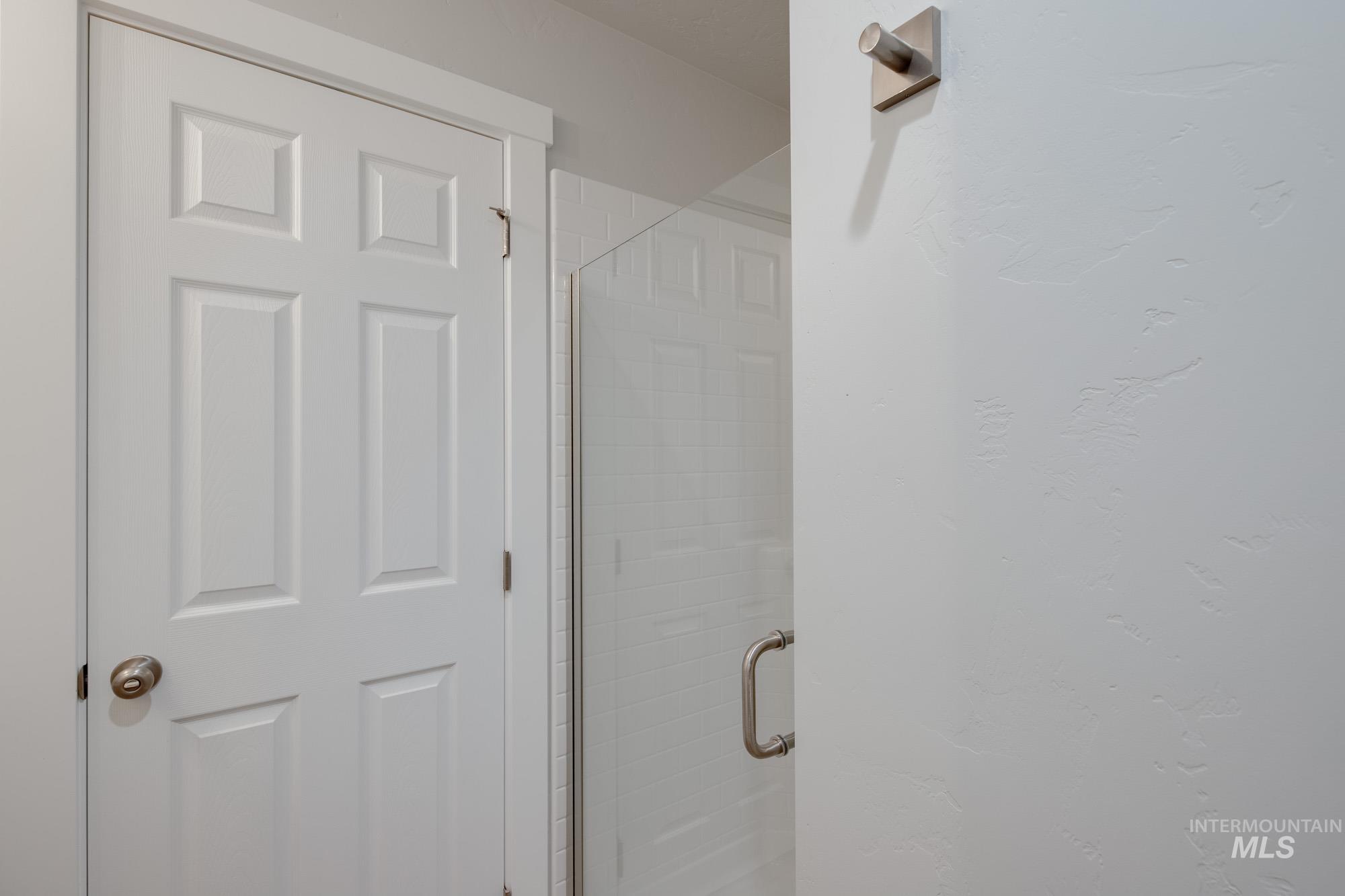 Bathroom featuring a stall shower