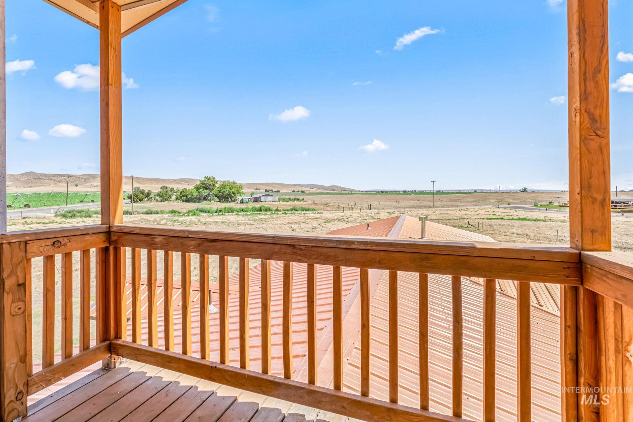 Wooden deck with a view of rural / pastoral area