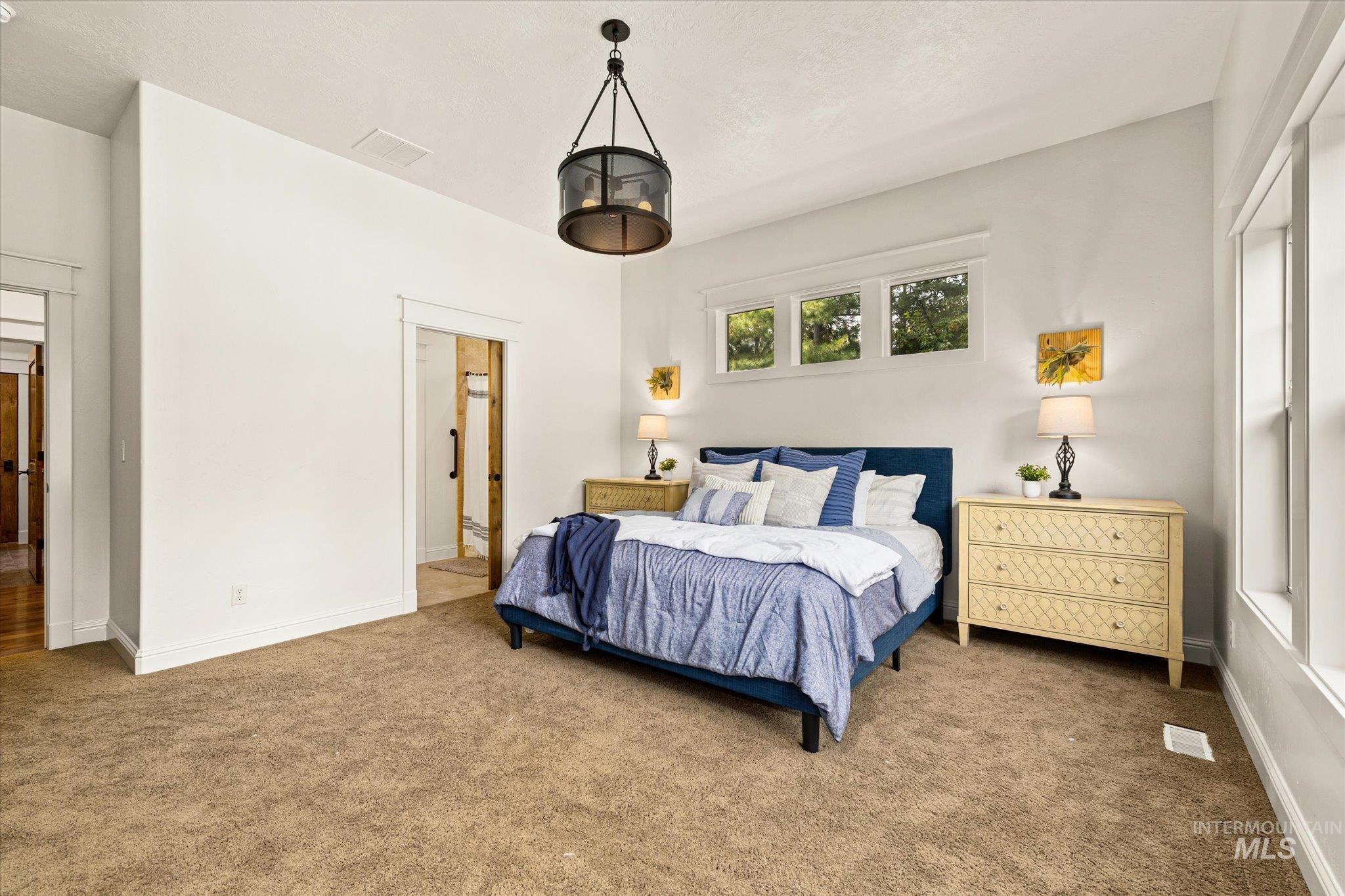 Bedroom featuring carpet floors