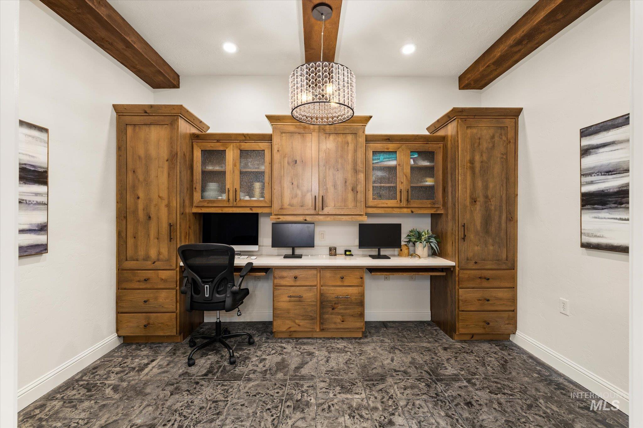 Home office with built in desk, a chandelier, beamed ceiling, and recessed lighting