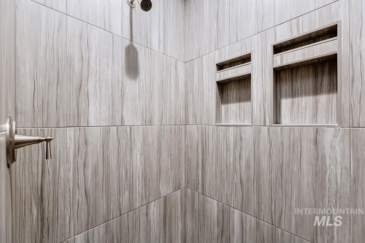 Bathroom view of tiled shower