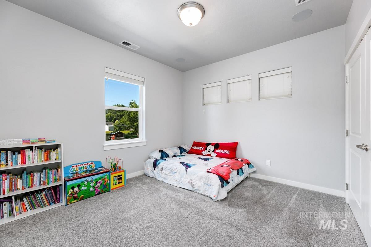 Bedroom with carpet flooring