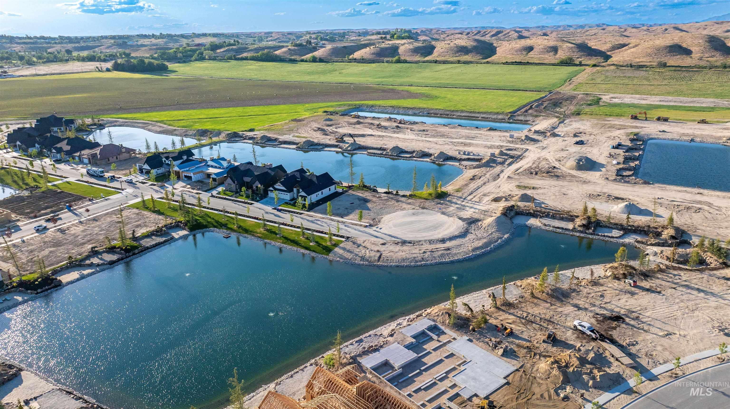 Aerial view of property and surrounding area featuring rural landscape