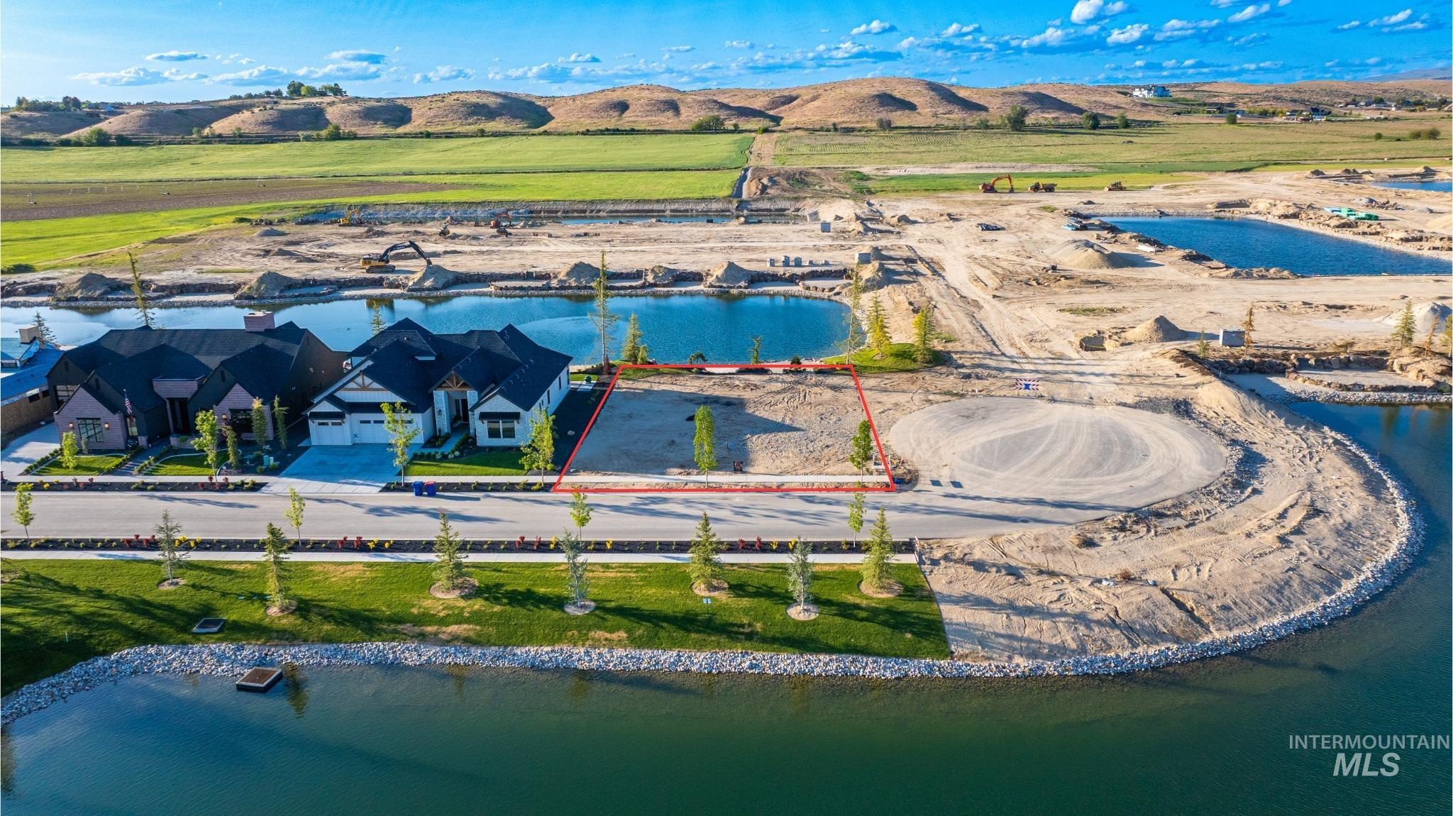 View of property location with property boundaries highlighted and a water and mountain view