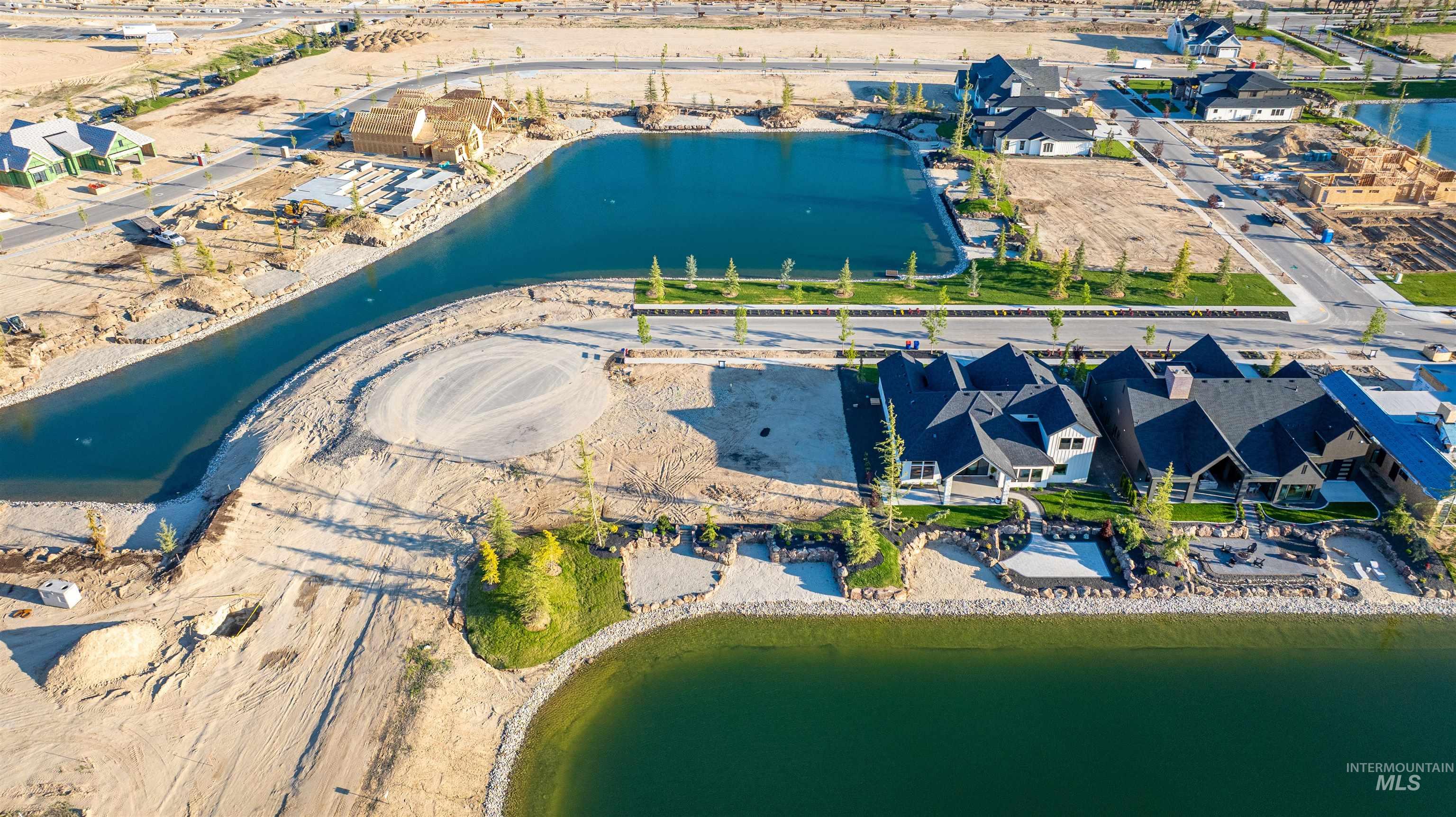 Aerial overview of property's location featuring a nearby body of water