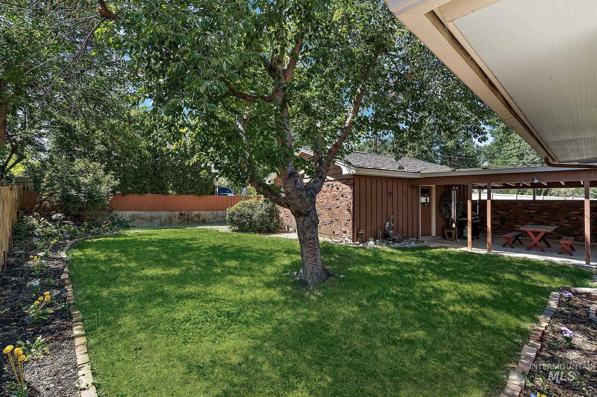 View of yard with a patio